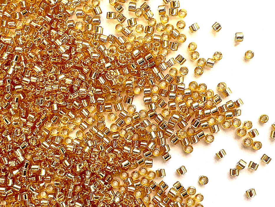 50 g Delica Glasperlen 11/0, Gold mit versilbertem Loch, Japanische Glasperlen Miyuki (Delica Seed Beads)