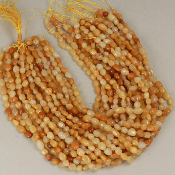 Edelsteinperlen 8x6 mm Jadegelbes Nugget glatt  Farbe_Yellow Farbe_ Brown