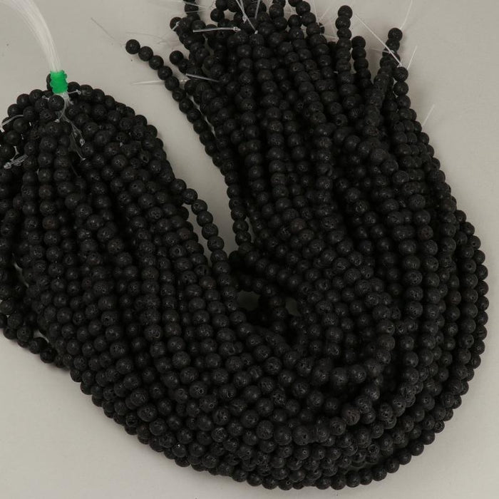 1 Strand 38/40 cm Edelsteinperlen 6x7 mm Lava Schwarz Rund  Farbe_Black