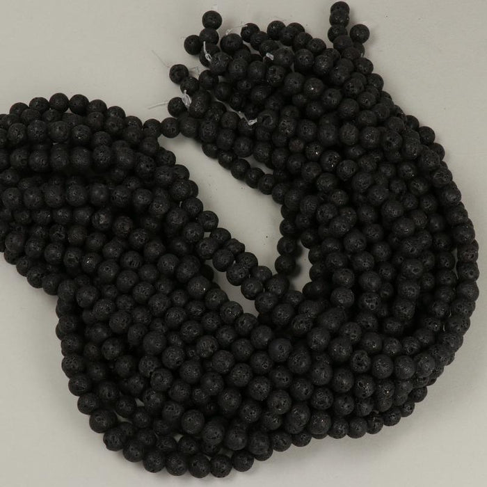 1 Strand 38/40 cm Edelsteinperlen 8x9 mm Lava Schwarz Rund  Farbe_Black